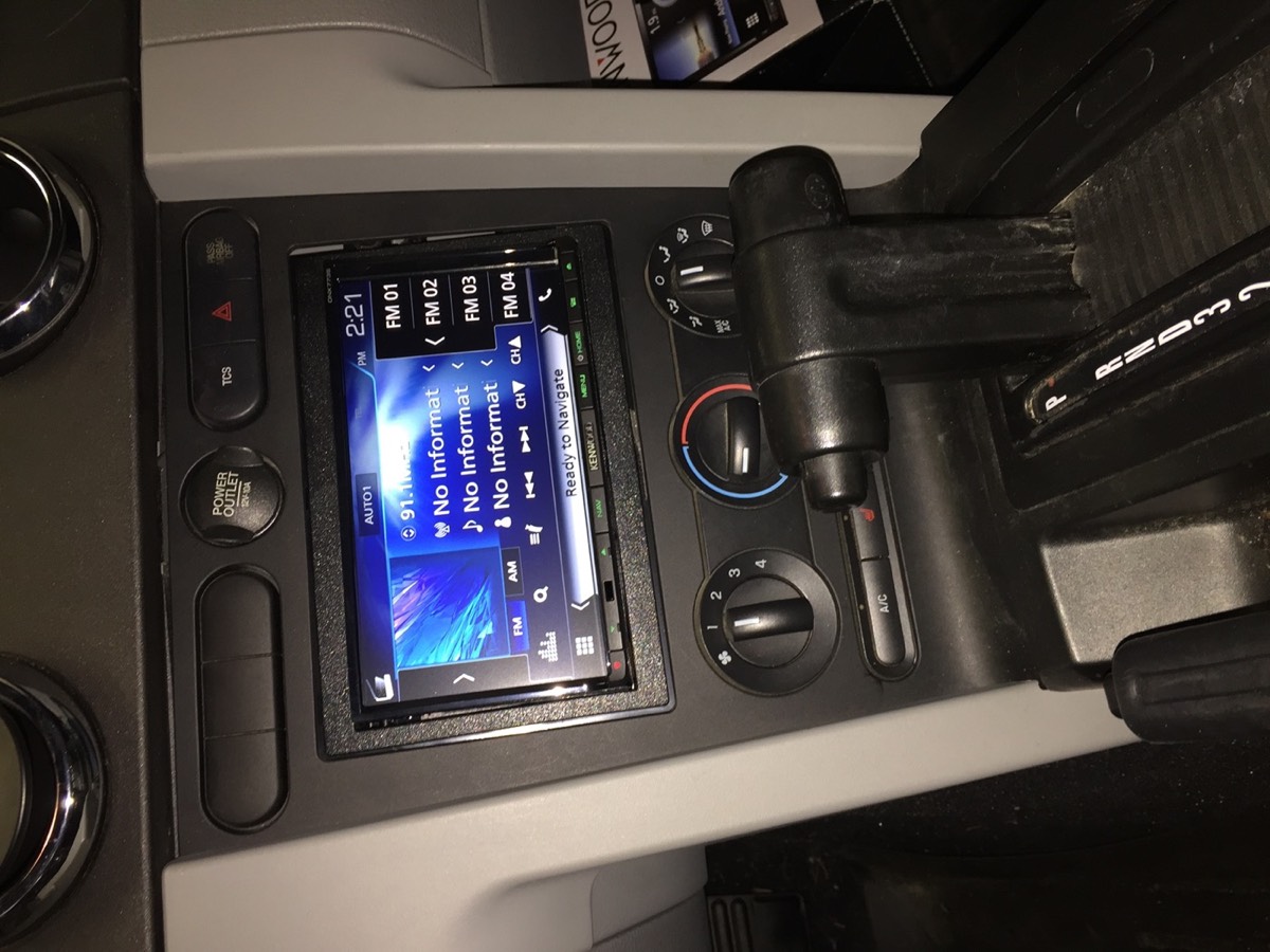 After: Factory radio removed and replaced