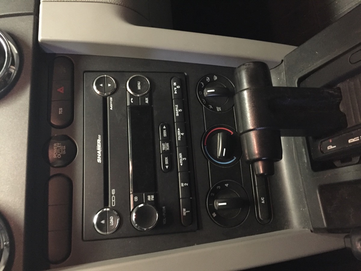 Before: Factory radio before replacement
