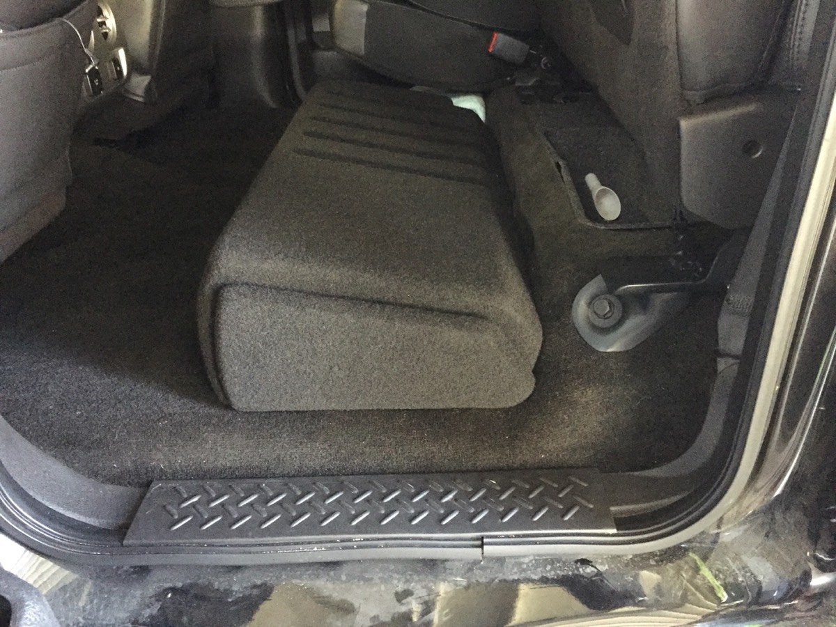 JL Audio stealth subwoofer box in a Ford F-350
