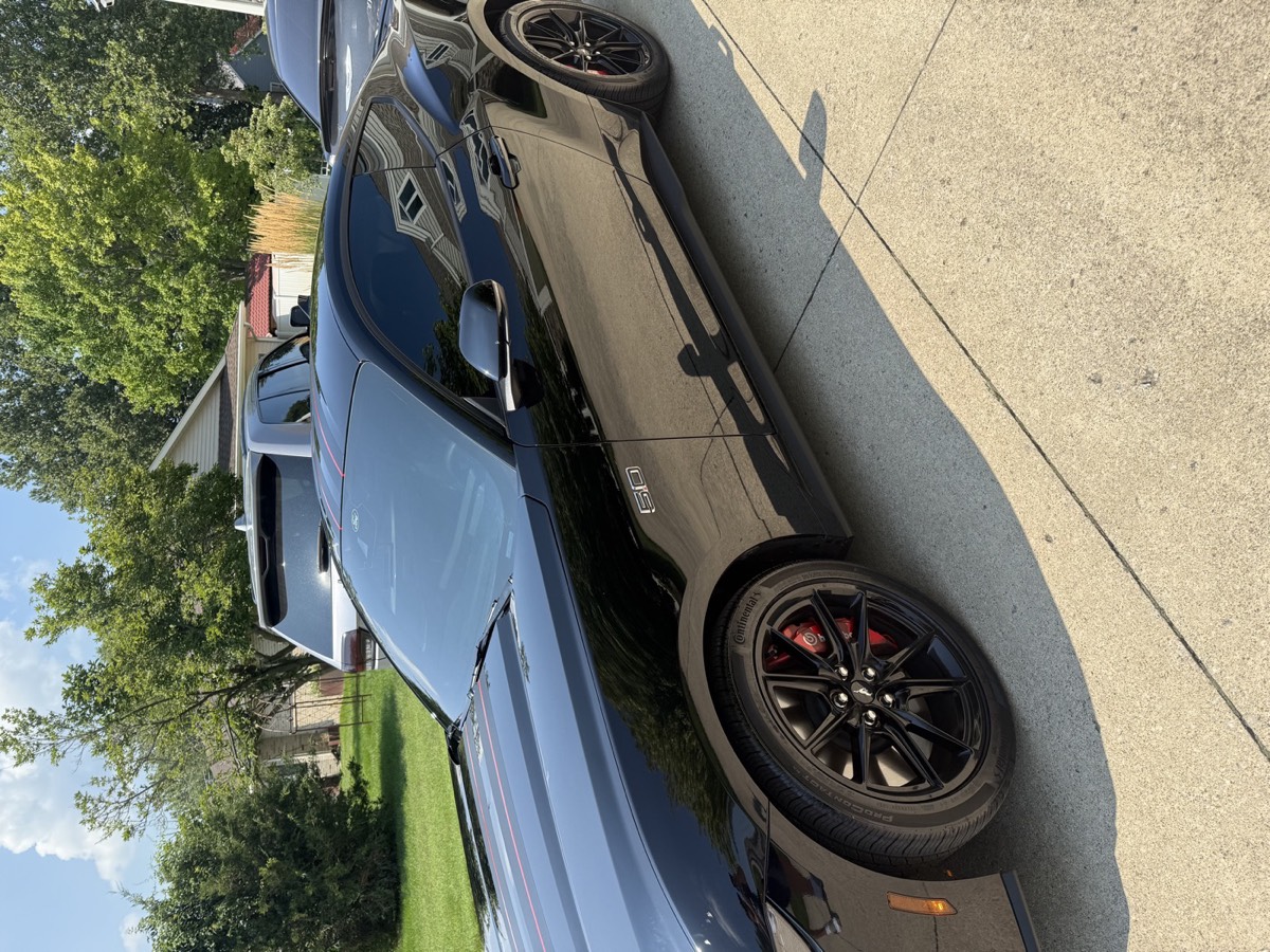 Black coupe with tinted windows